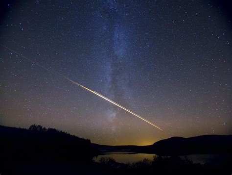 Meteor Track Over Scottish Loch Photograph By Science Photo Library