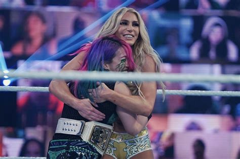 Report New Wwe Womens Tag Team Champions Charlotte Flair Asuka