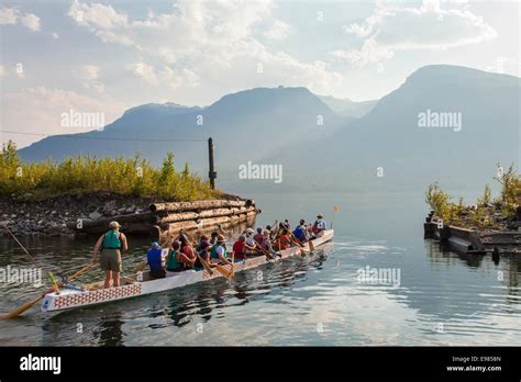 Woman Rowing Dragon Boat On Slocan Lake New Denver Slocan Valley