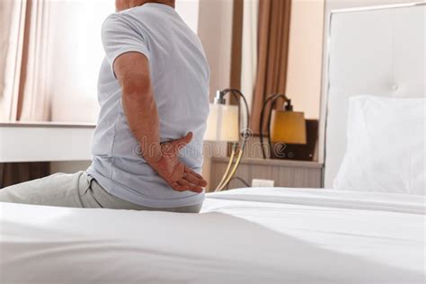 Asian Old Man Is Having Back Pain After Slept Stock Image Image Of