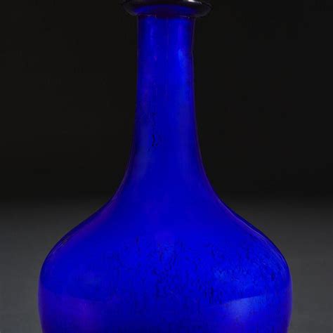 A Pair Of Cobalt Blue Glass Bottle Lamps Bada