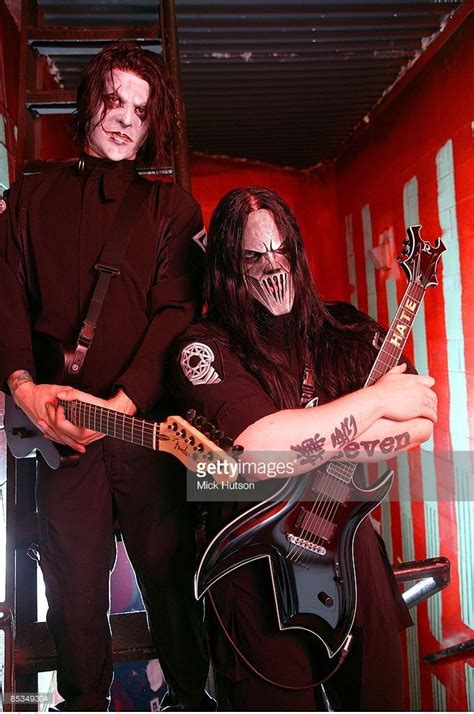 Photo Of Mick THOMSON And Jim ROOT And SLIPKNOT Posed Portrait Of