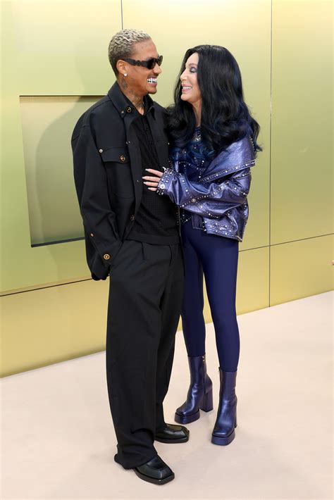 Cher, boyfriend Alexander 'AE' Edwards kiss during red carpet debut