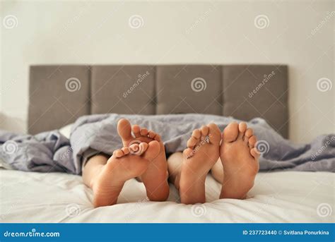 Feet Of Lesbian Girls Under Blanket On Bed Stock Photo Image Of Partial Interior 237723440