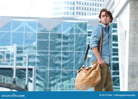 Portrait Of A Trendy Young Man Walking Stock Photo Image Of Fashion