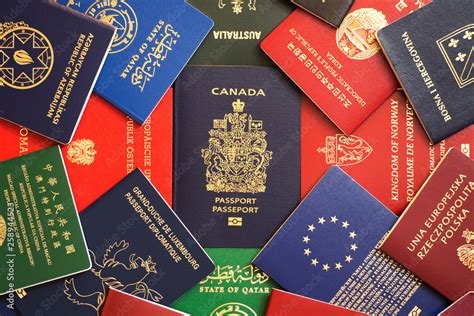 Canadas Blue Biometric Passport Among Multicolored Passports Of Many