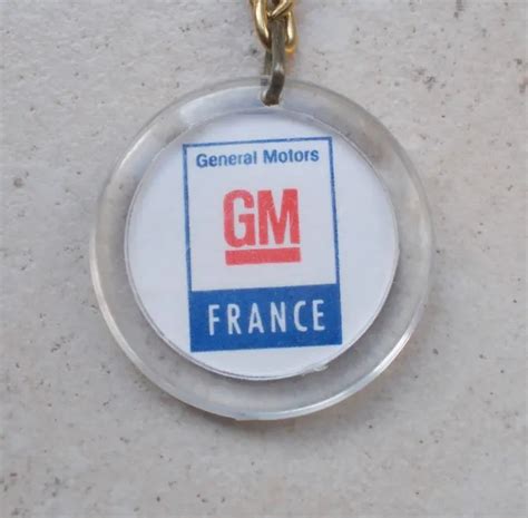 ANCIEN PORTE CLEFS clés vintage GM General Motors AC automobilia 1960s