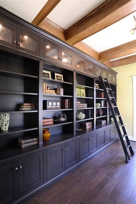 Mullet Cabinet Dark Stained Library Shelving With A Sliding Ladder