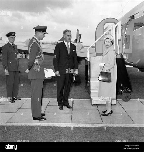 Queen Elizabeth Ii Boarding Heron Aircraft Queens Flight Heathrow Airport Black And White Stock