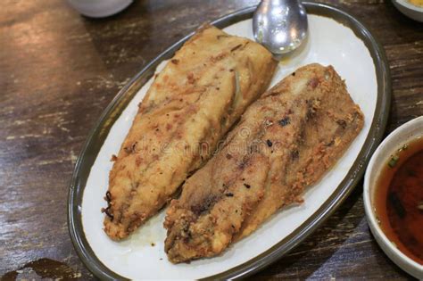 Grilled Mackerel Fish On Table Traditional Korean Food Stock Image