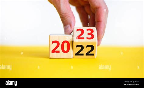 Happy New Year Symbol Businessman Turns A Cube Symbolize The