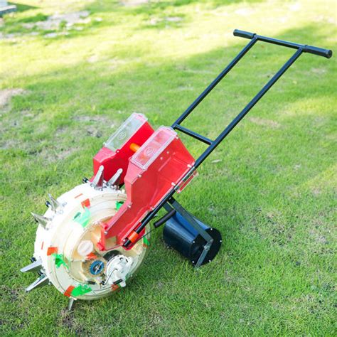 China Home Use Hand Push Corn Planter Manual Corn Maize Fertilizer