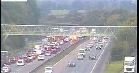 M5 Lorry Crash Queuing Traffic After Lorry Crashes Through Central