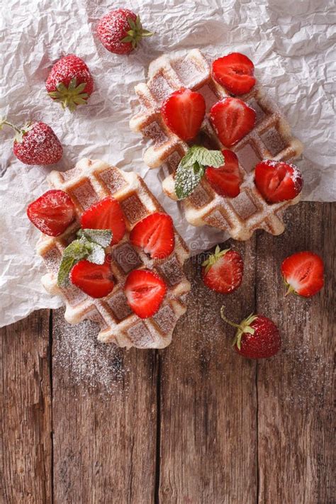 Belgian Waffles With Strawberries And Powdered Sugar Close Up V Stock