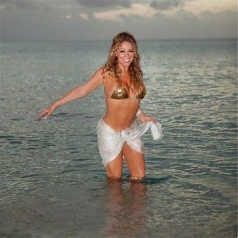 Mariah Carey Flaunts Her Bikini Body In A Gold Swimsuit During Her