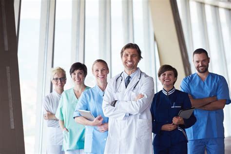 Group Of Medical Staff At Hospital Stock Image Image Of Happy Coat