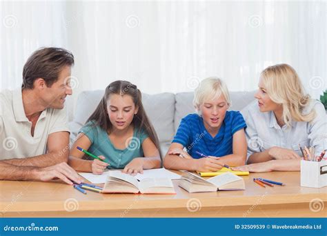 Parents Helping Children Doing Homework Stock Image | CartoonDealer.com #62321773