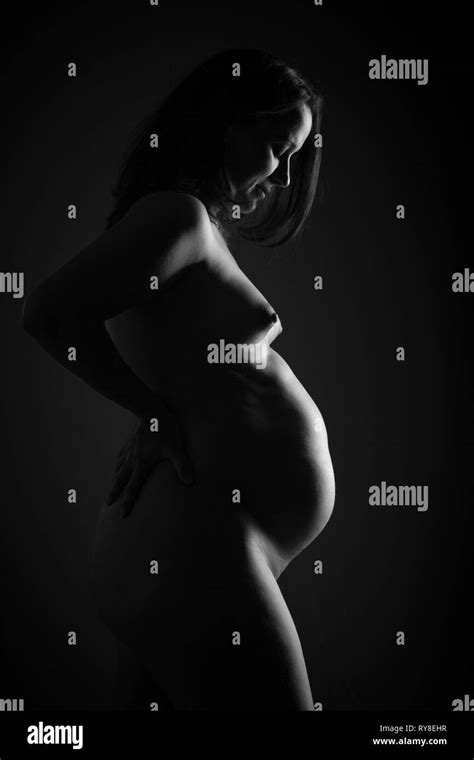 Nude Pregnant Woman Touching Her Belly Side View Black And White Belly Close Up Isolated On