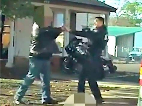 suspect shot  times  pointing gun  officers face