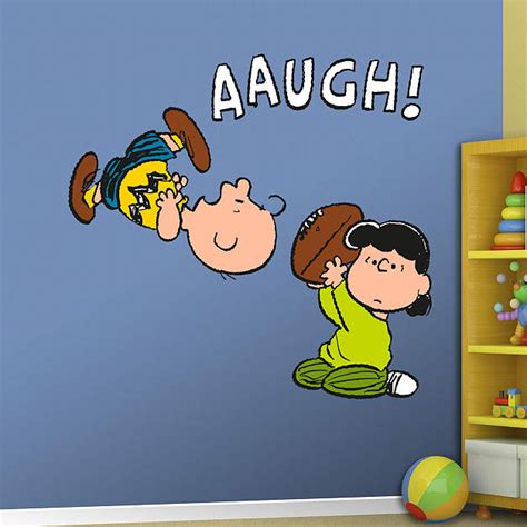 Lucy Pulls Football From Charlie Brown Wall Decal | Shop Fathead® for Peanuts Decor