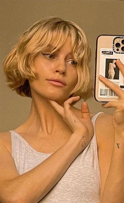 20 Chic Parisian French Bobs Blonde French Bob With Wavy Bangs In 2024 Chic Haircut Hair