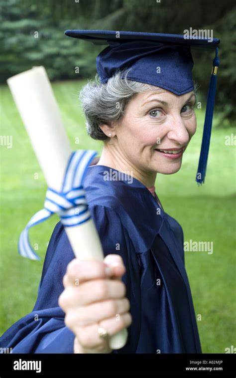 Senior Woman College Graduate With Diploma Stock Photo Alamy