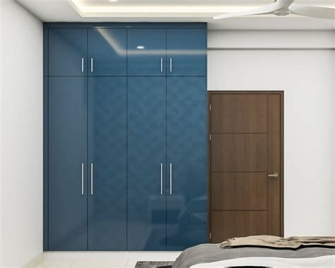 Modern Wardrobe In Shore Blue With Suede And Glossy Finish Livspace