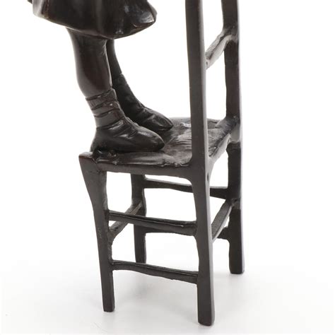 Bronze Sculpture Of A Girl On Chair Ebth