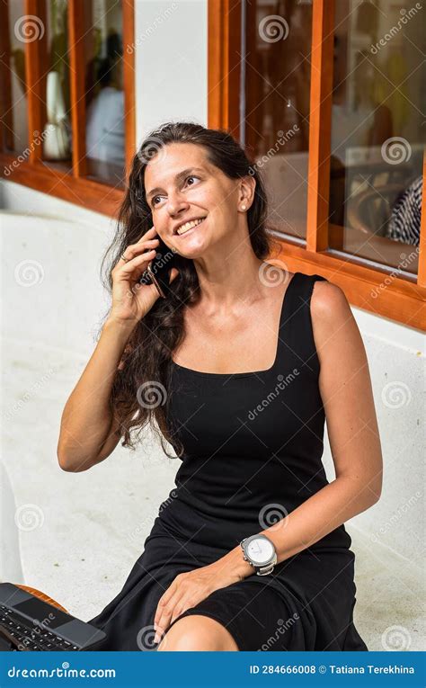 Portrait Of 40 Years Old Business Woman Without Make Up Talking On The