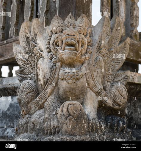 Balinese Demon Statue In Pura Luhur Uluwatu Temple Bali Stock Photo