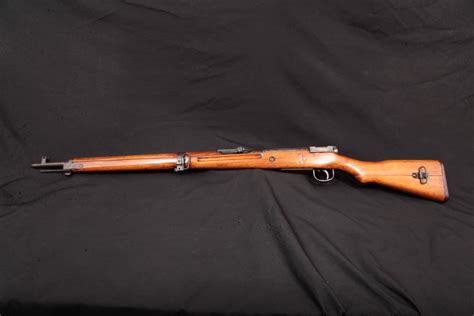 An Arisaka Type Short Rifle That Is Complete With Its Flower Intact