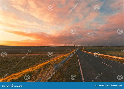 Beautiful Sunset Over Road In Australian Countryside Stock Image