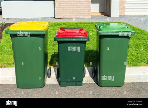 Australian wheelie bins avec couvercles colorés pour les matières