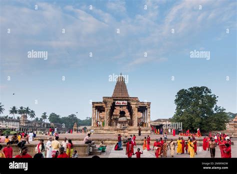 Brihadisvara temple full view with nandi mandapam with pilgrims walking ...