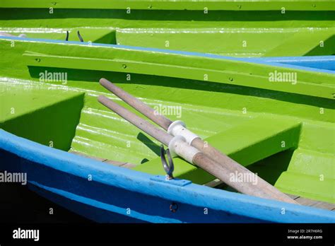 Pair Of Oars In A Wooden Rowing Boat Stock Photo Alamy