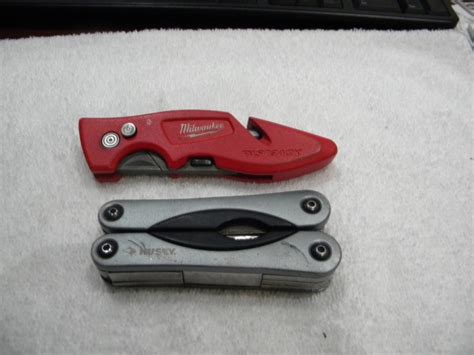 Lot Husky Multi Tool Pliersand Milwaukee Utility Knife