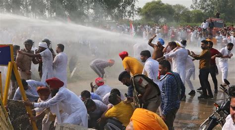 Farmers Intensify Protests Water Cannons Used To Stop Congress