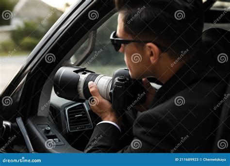 Private Detective With Camera Spying From Car Stock Image Image Of