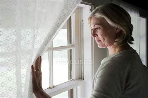 Mature Milf In The Window Telegraph