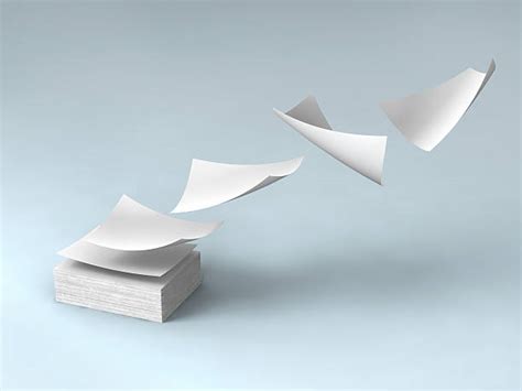 Flying Paper Stock Photos Pictures And Royalty Free Images Istock