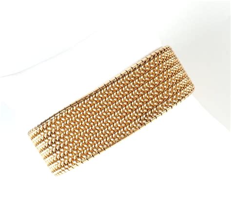 Bracelet ruban en or jaune 18K 750 oo maille tressée fermoir à