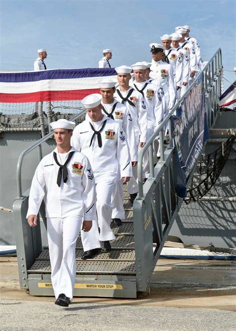 Sailors Depart The Guided Missile Frigate USS Simpson FFG 56 During