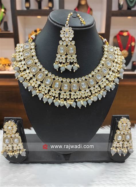 Elegant Natural Pearls And Mother Of Kundan Necklace Set