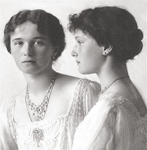 An Old Black And White Photo Of Two Women