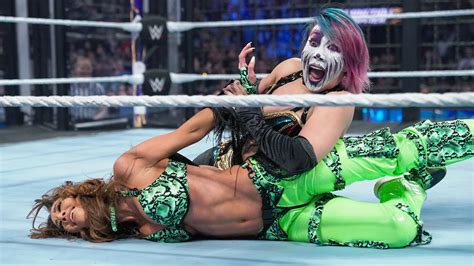 Asuka won the Elimination Chamber Match to earn the right to challenge ...