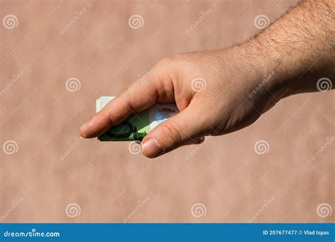 Man Hands Giving Money Like A Bribe Or Tips Holding EURO Banknotes On