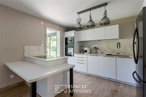 Vente Maison rénovée avec véranda à SAINT GENIS LES OLLIERES 124 m2