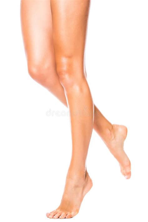 Beautiful Slender Blonde Sunbathes In The Solarium In A Vertical Tanning Bed Stands And Smiles