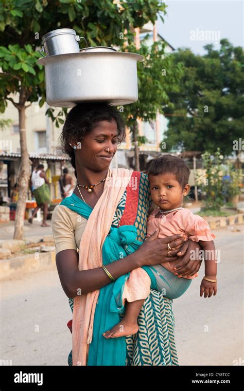 Poor Indian Mother With Baby