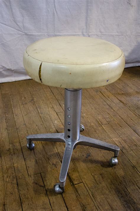 White Adjustable Low Rolling Stool Zapprops